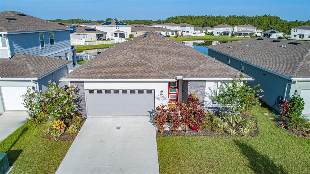 4331 Southern Vista Loop St. Cloud, FL 34772 - Photo 1 of 1 a view of a house with a yard and sitting area