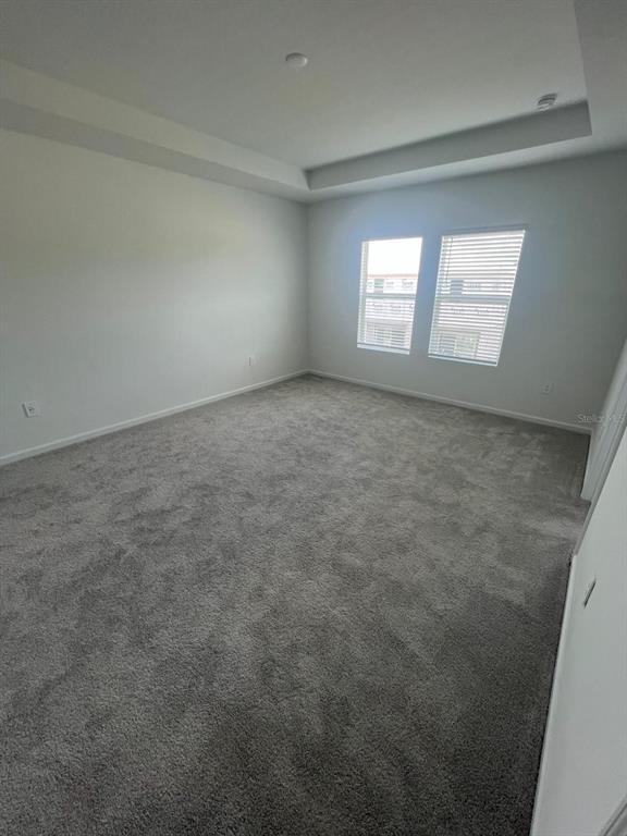 2660 Skyline Loop Kissimmee, FL 34758 - Photo 11 of 19 a view of an empty room and window