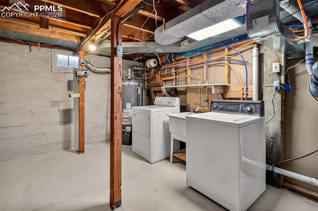 a utility room with dryer and washer