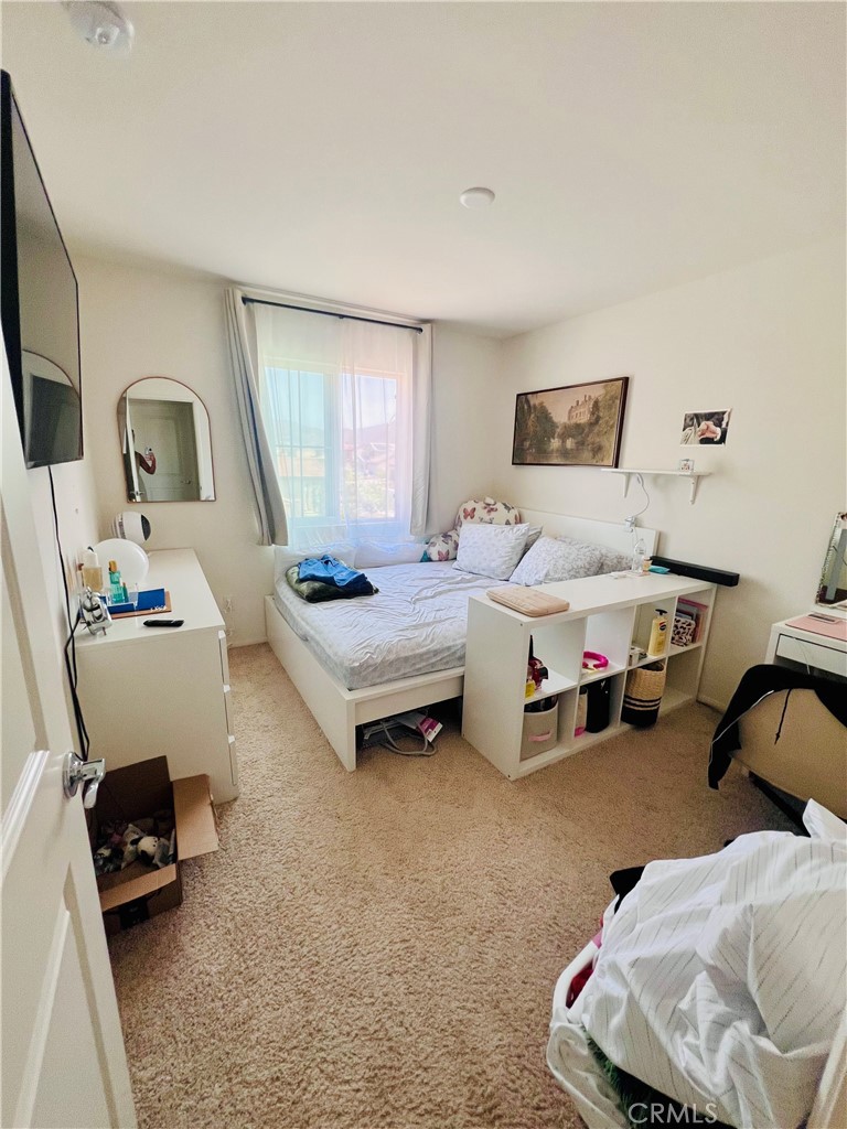 31381 Linden Flower Road Winchester, CA 92596 - Photo 20 of 33 a bedroom with furniture and a couch