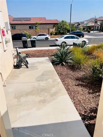 a view of a swimming pool with lawn chairs