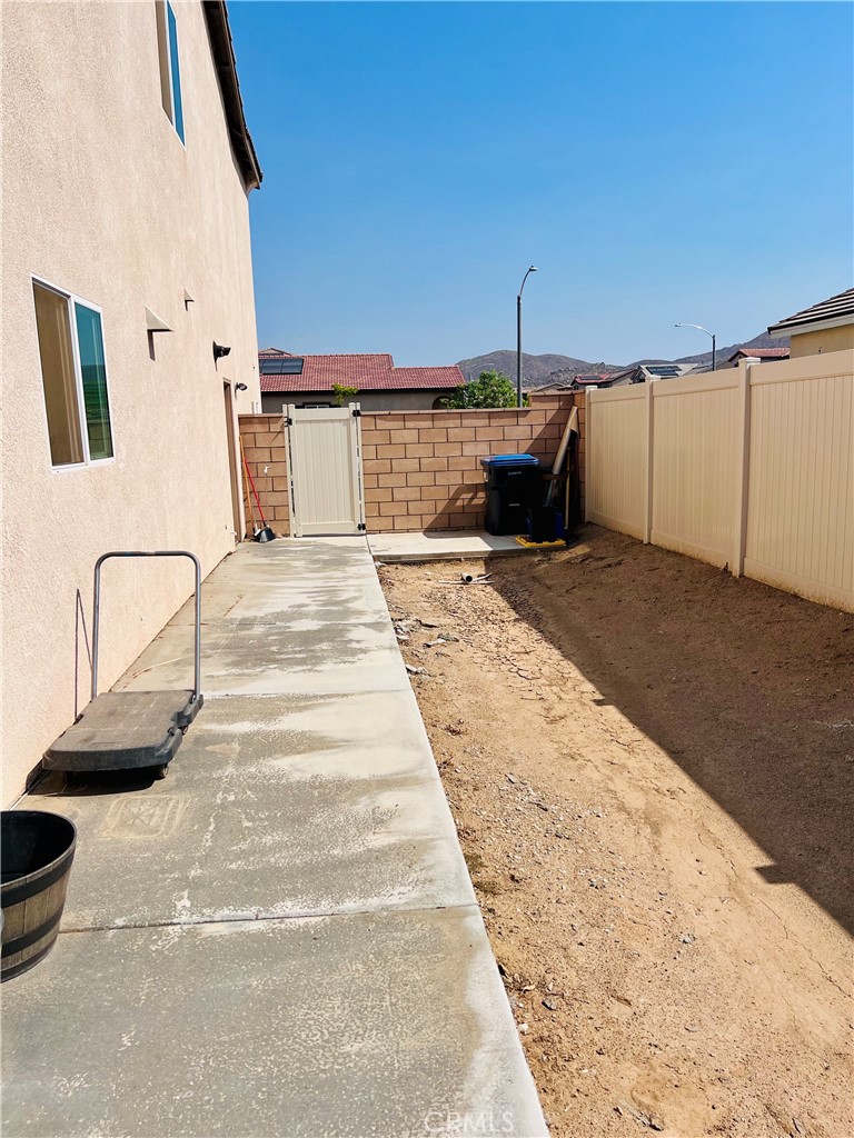 31381 Linden Flower Road Winchester, CA 92596 - Photo 26 of 33 a view of a patio with table and chairs