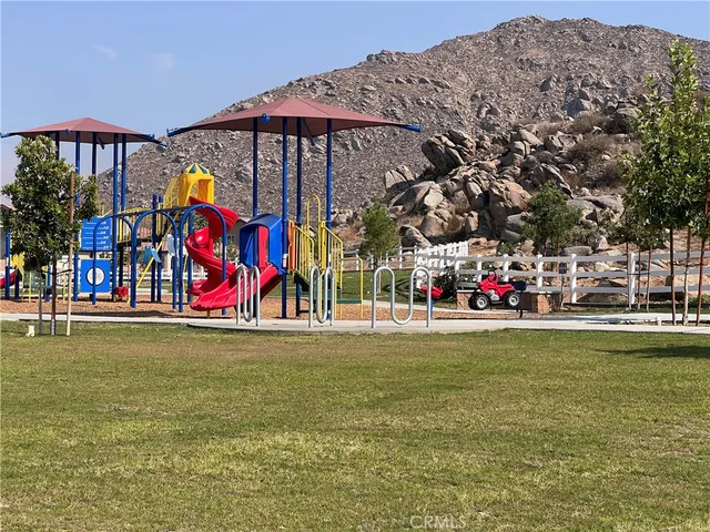 a view of swimming pool with an outdoor space and seating