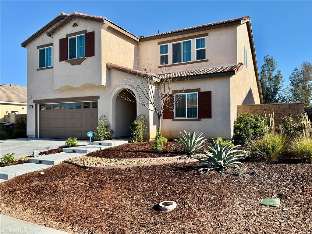 31381 Linden Flower Road Winchester, CA 92596 - Photo 32 of 33 a front view of a house with garden