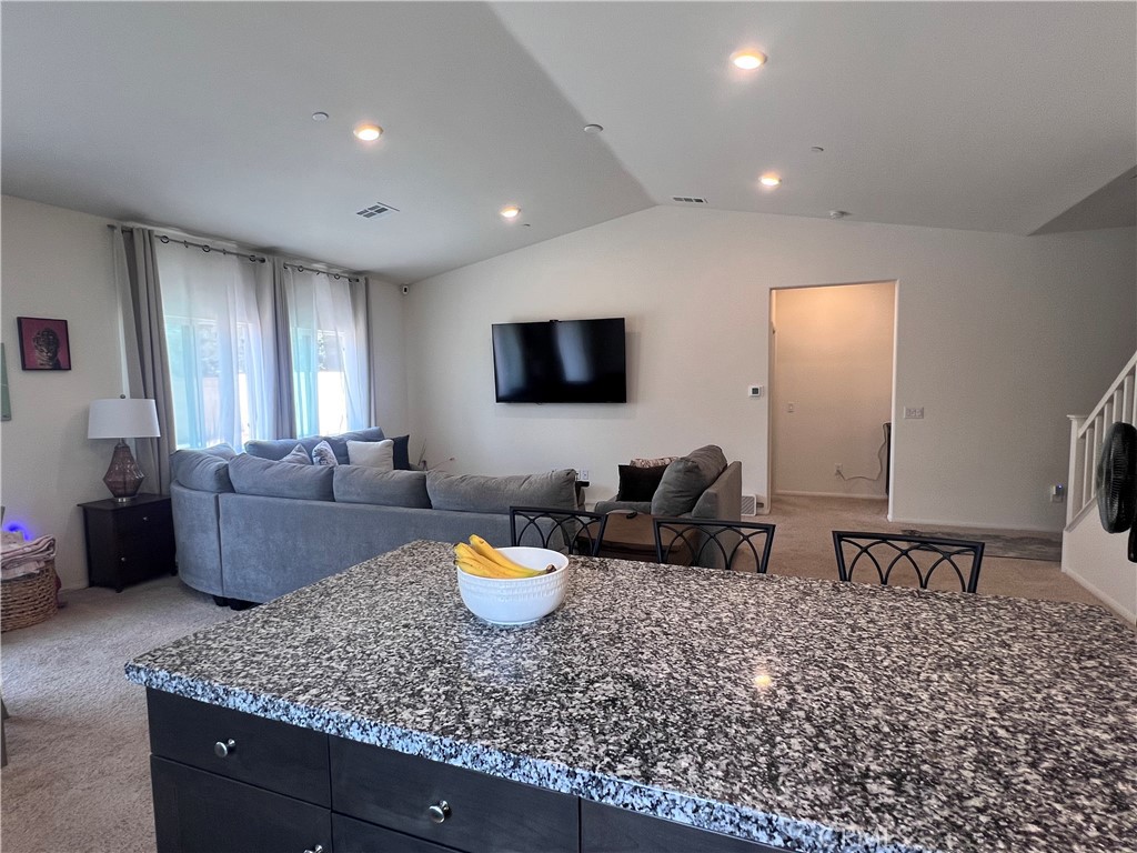31381 Linden Flower Road Winchester, CA 92596 - Photo 7 of 33 a living room with furniture and a flat screen tv