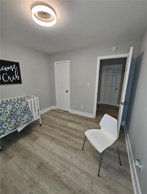 2968 McGlynn Court Decatur, GA 30034 - Photo 13 of 34 a bedroom with a bed and a chair