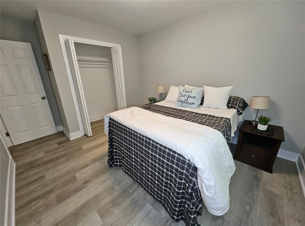 2968 McGlynn Court Decatur, GA 30034 - Photo 15 of 34 a bed sitting in a bedroom next to a window