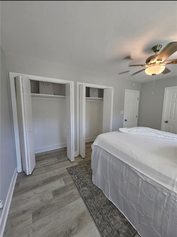 2968 McGlynn Court Decatur, GA 30034 - Photo 17 of 34 a spacious bedroom with a bed and a lamp