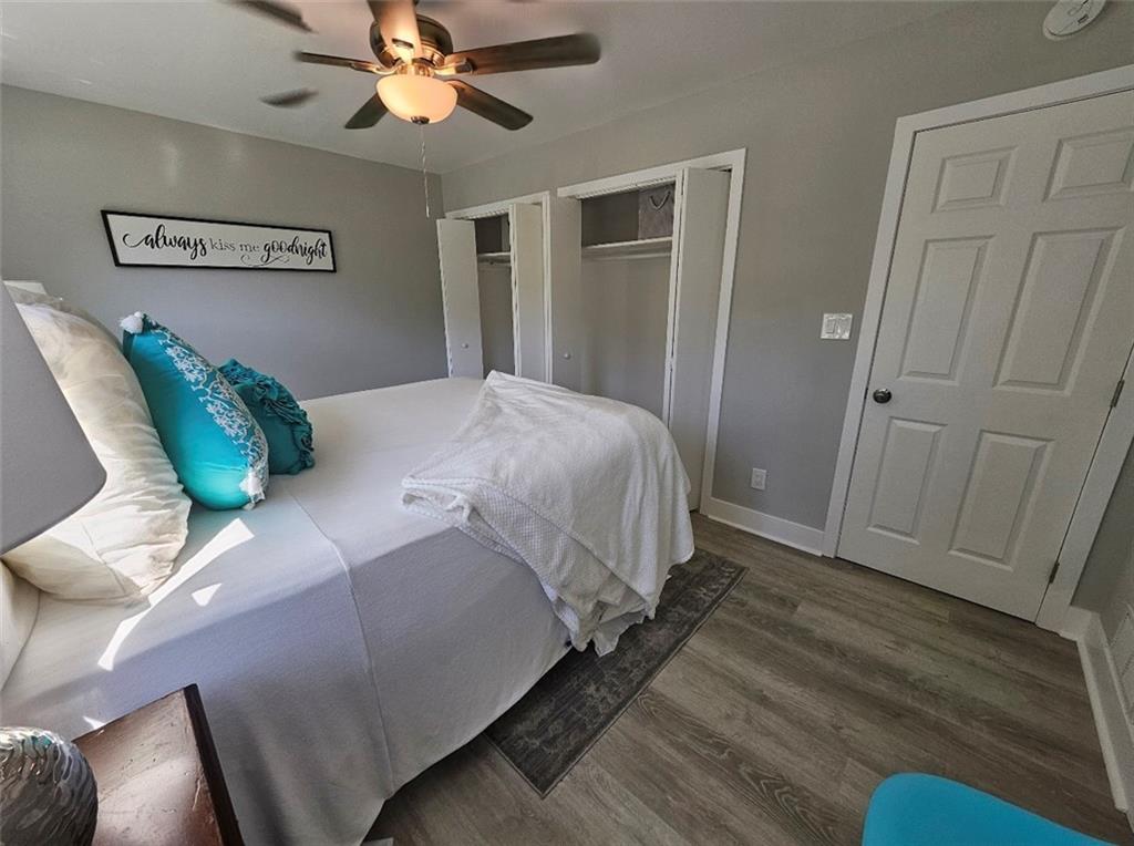 2968 McGlynn Court Decatur, GA 30034 - Photo 19 of 34 a bedroom with a bed and a chandelier