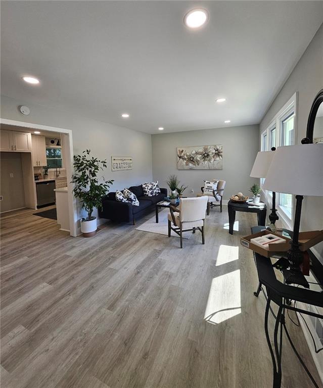 2968 McGlynn Court Decatur, GA 30034 - Photo 27 of 34 a living room with furniture and a wooden floor