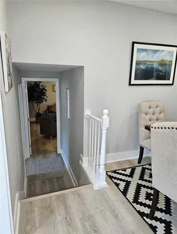 a view of livingroom with furniture and front door