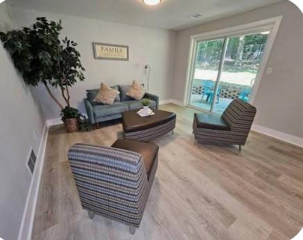 2968 McGlynn Court Decatur, GA 30034 - Photo 9 of 34 a living room with furniture and a potted plant