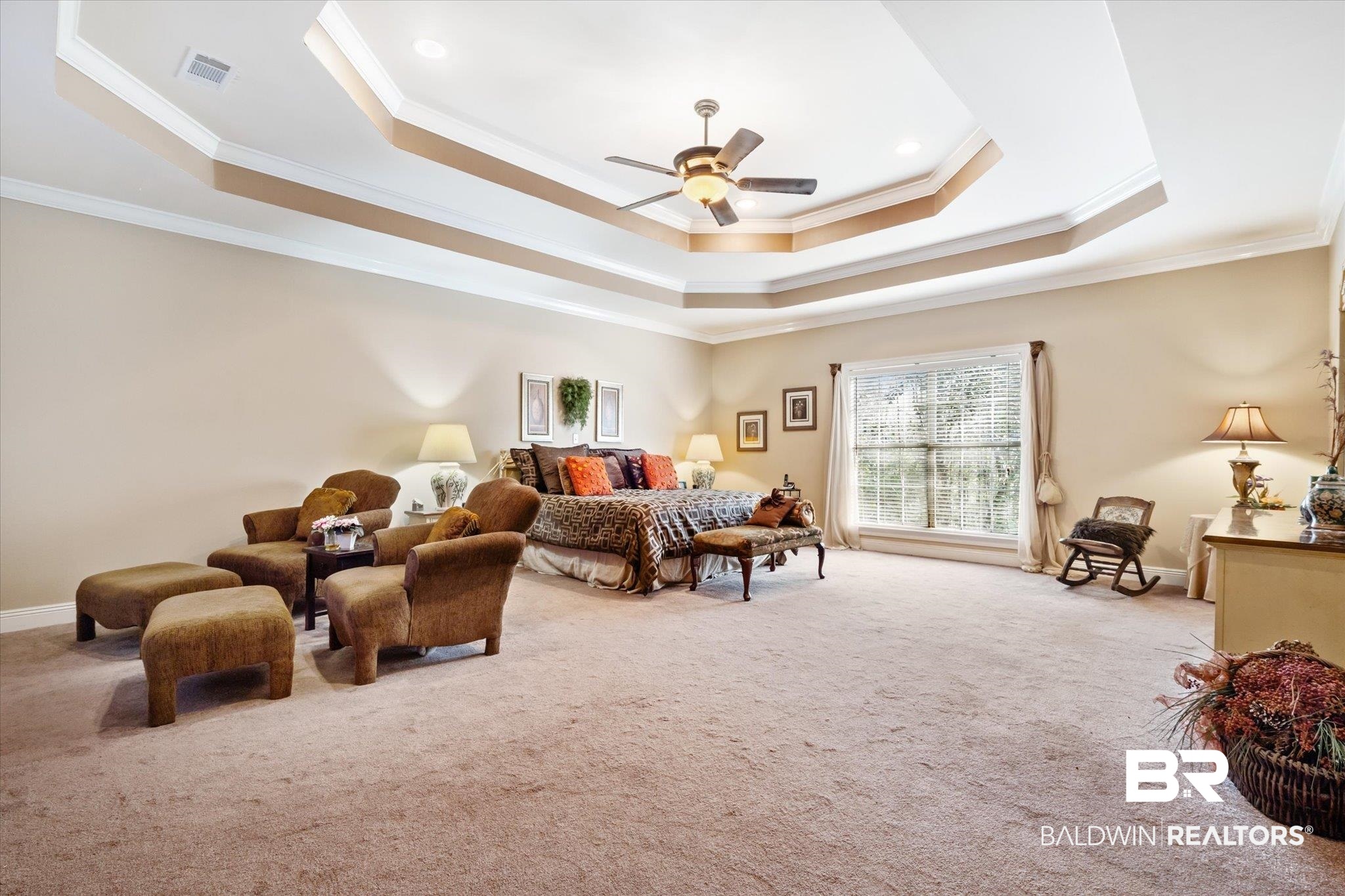 2400 Waterford Road Semmes, AL 36575 - Photo 14 of 30 Carpeted bedroom featuring a tray ceiling, crown molding, and ceiling fan