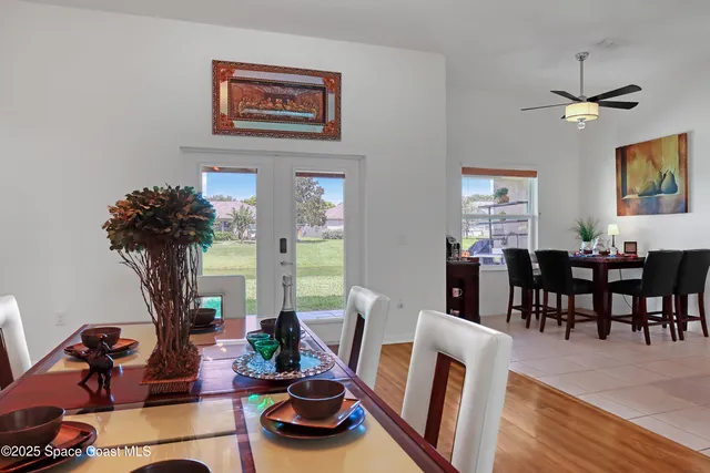 a view of a garden with a bench in the garden