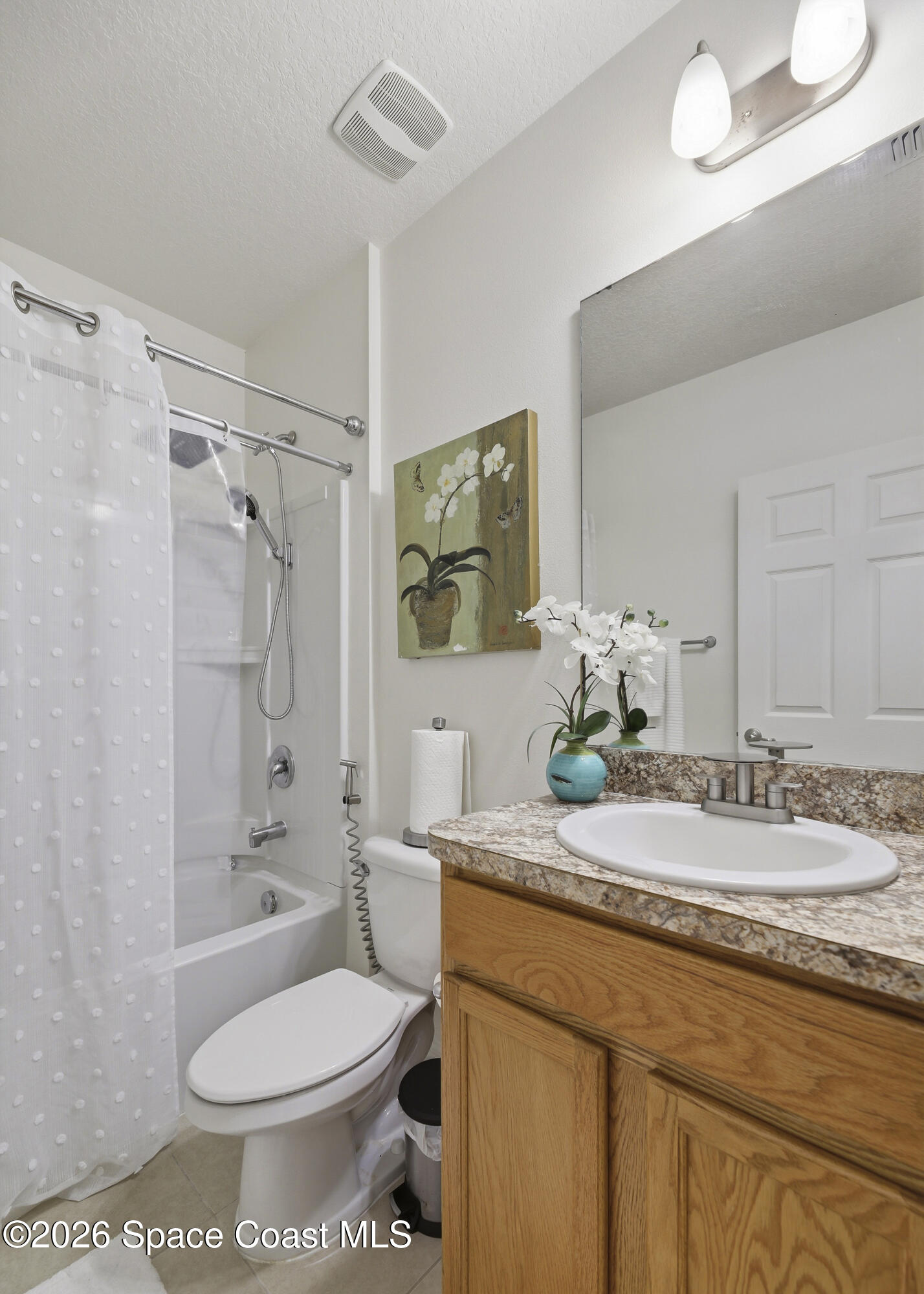 1121 Morgan Circle Northeast Palm Bay, FL 32905 - Photo 76 of 115 a bathroom with a granite countertop sink toilet and shower