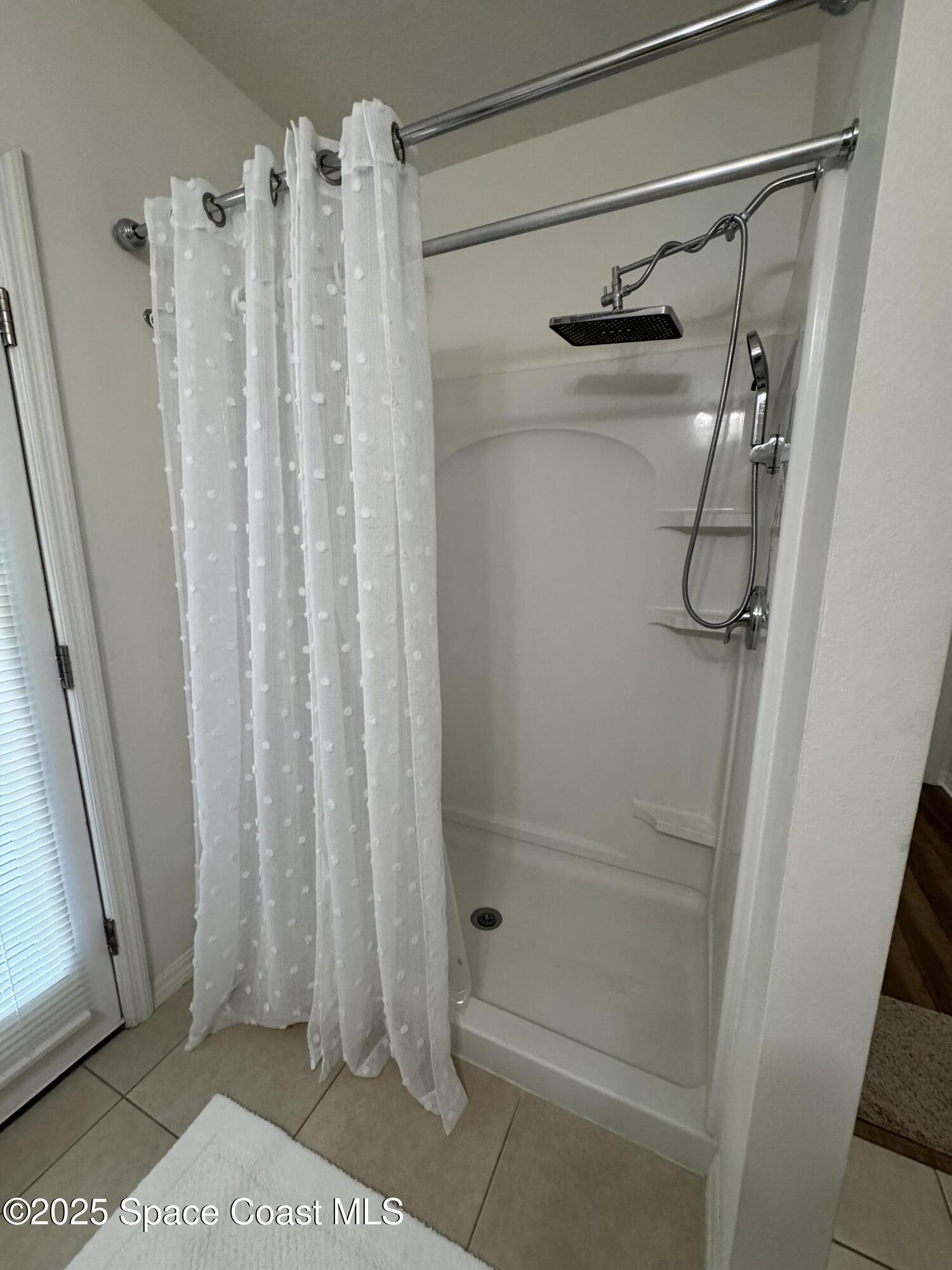 1121 Morgan Circle Northeast Palm Bay, FL 32905 - Photo 85 of 115 a bathroom with a shower