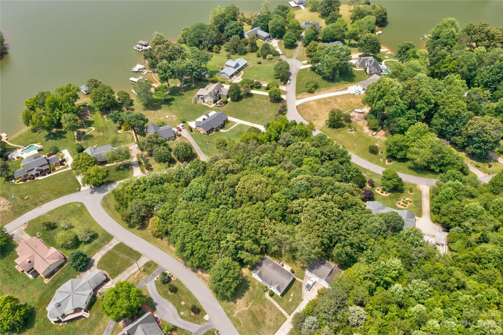 169-171 Harbor Point Drive Cherryville, NC 28021 - Photo 3 of 6 an aerial view of a residential houses with yard