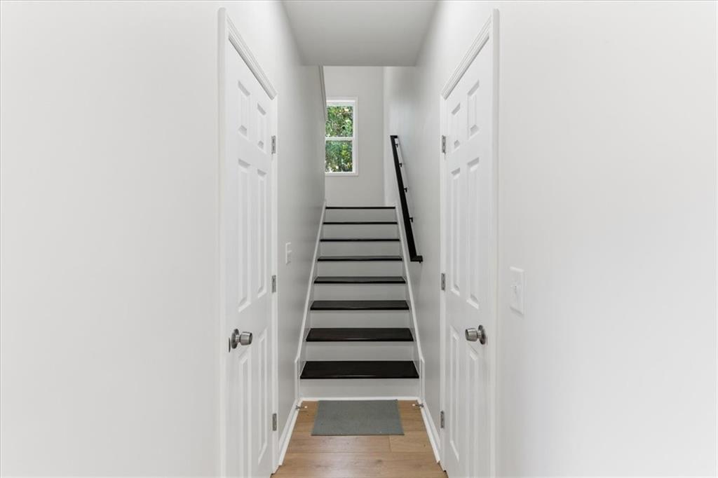 119 Jackson Street Cedartown, GA 30125 - Photo 20 of 58 a view of a hallway with a white door and front door