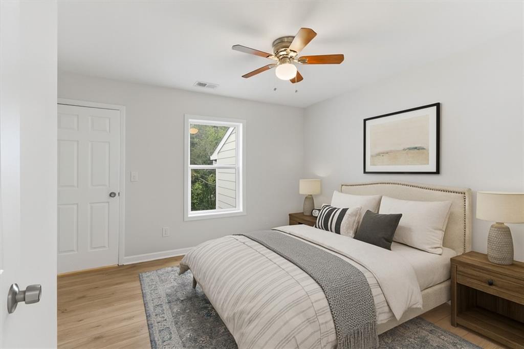 119 Jackson Street Cedartown, GA 30125 - Photo 29 of 58 a bedroom with a large bed and a window