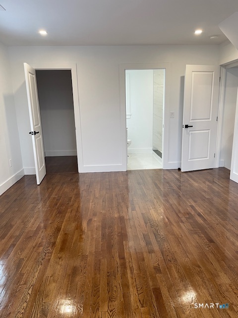 1 Cedar Road Danbury, CT 06811 - Photo 21 of 24 a view of an empty room with wooden floor and closet