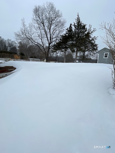 1 Cedar Road Danbury, CT 06811 - Photo 4 of 24 a view of snow covered with trees