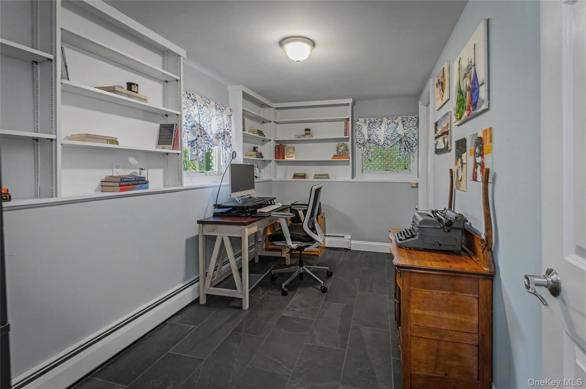 41 Cross Pond Road Pound Ridge, NY 10576 - Photo 31 of 41 a view of a workspace with furniture and a window