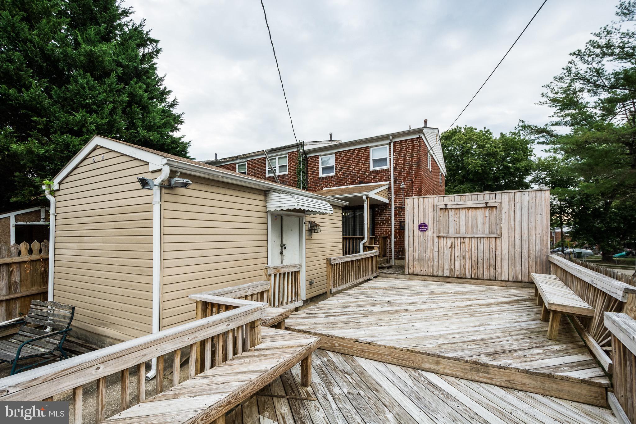 676 Queensgate Road Baltimore, MD 21229 - Photo 3 of 30 HUGE deck with outside shed with electricity