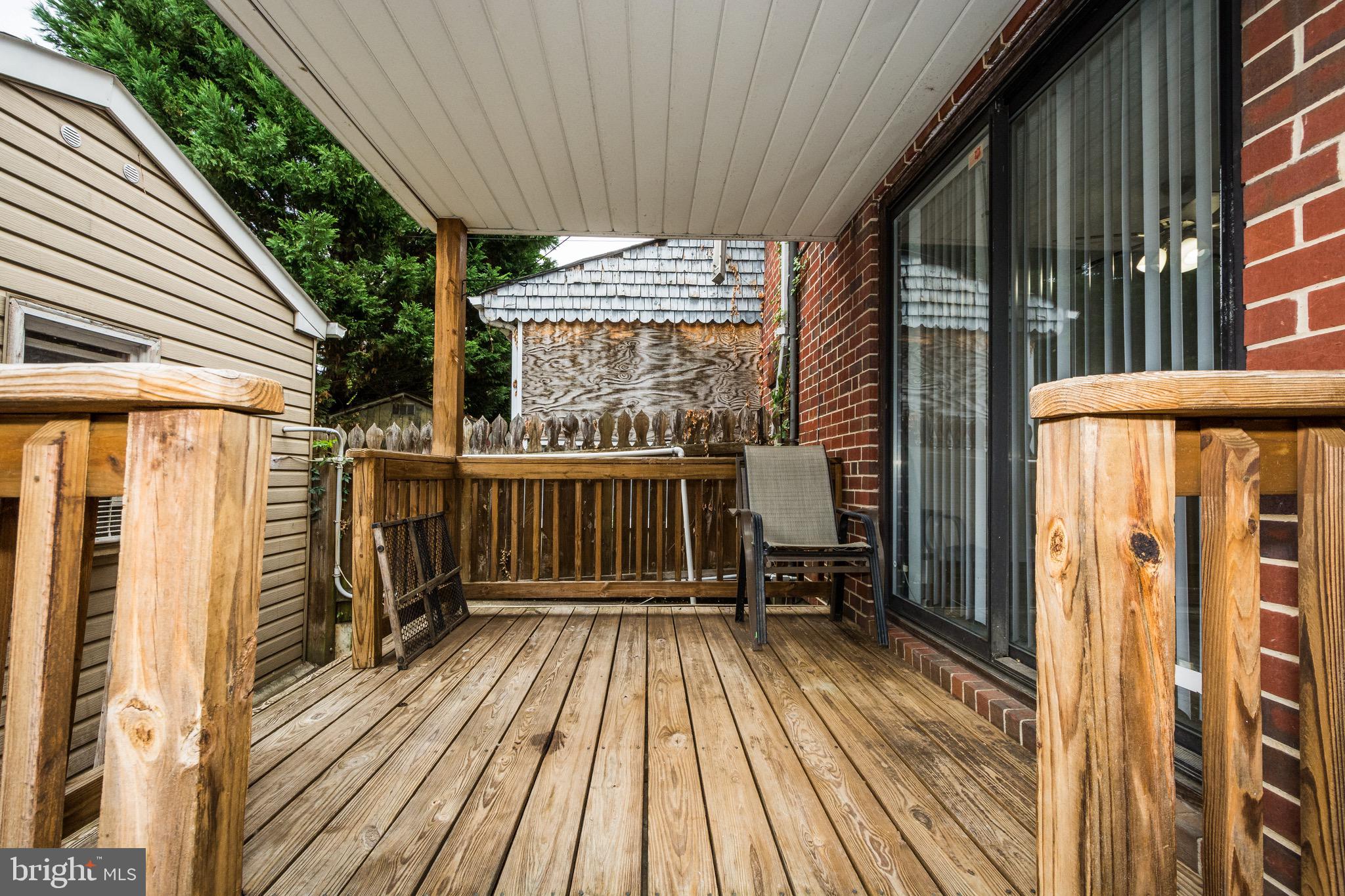 676 Queensgate Road Baltimore, MD 21229 - Photo 5 of 30 covered back porch