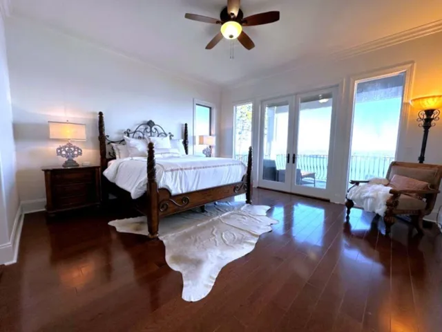 a bed room with bed and window