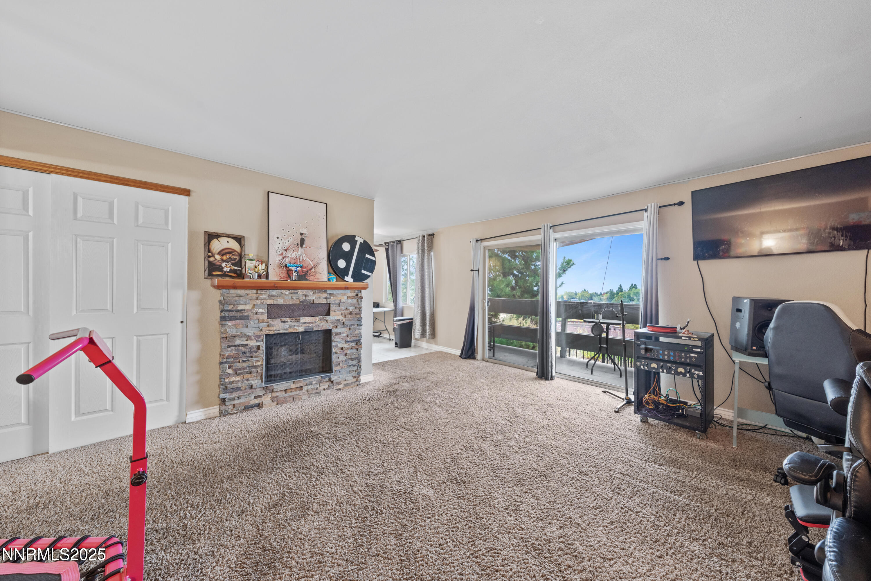 3031 Cashill Boulevard Reno, NV 89509 - Photo 12 of 22 a view of a livingroom with furniture and a fireplace