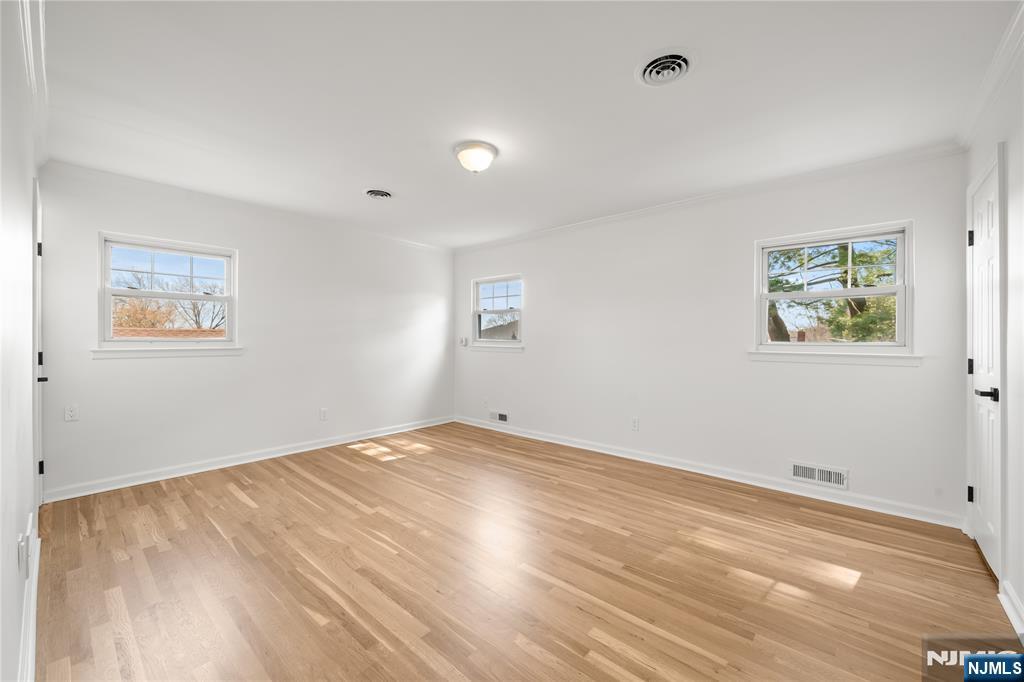 181 Haddenfield Road Clifton, NJ 07013 - Photo 13 of 34 a view of empty room with wooden floor