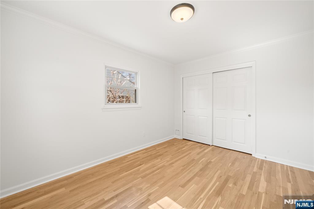 181 Haddenfield Road Clifton, NJ 07013 - Photo 16 of 34 a view of a room with wooden floor