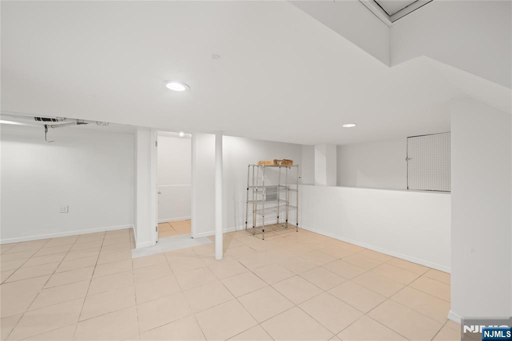 181 Haddenfield Road Clifton, NJ 07013 - Photo 25 of 34 a view of an empty room with a window