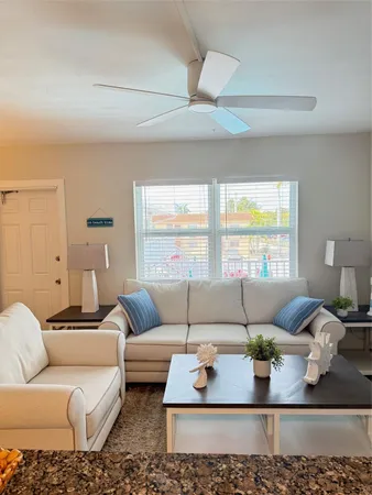 a living room with furniture and a couch