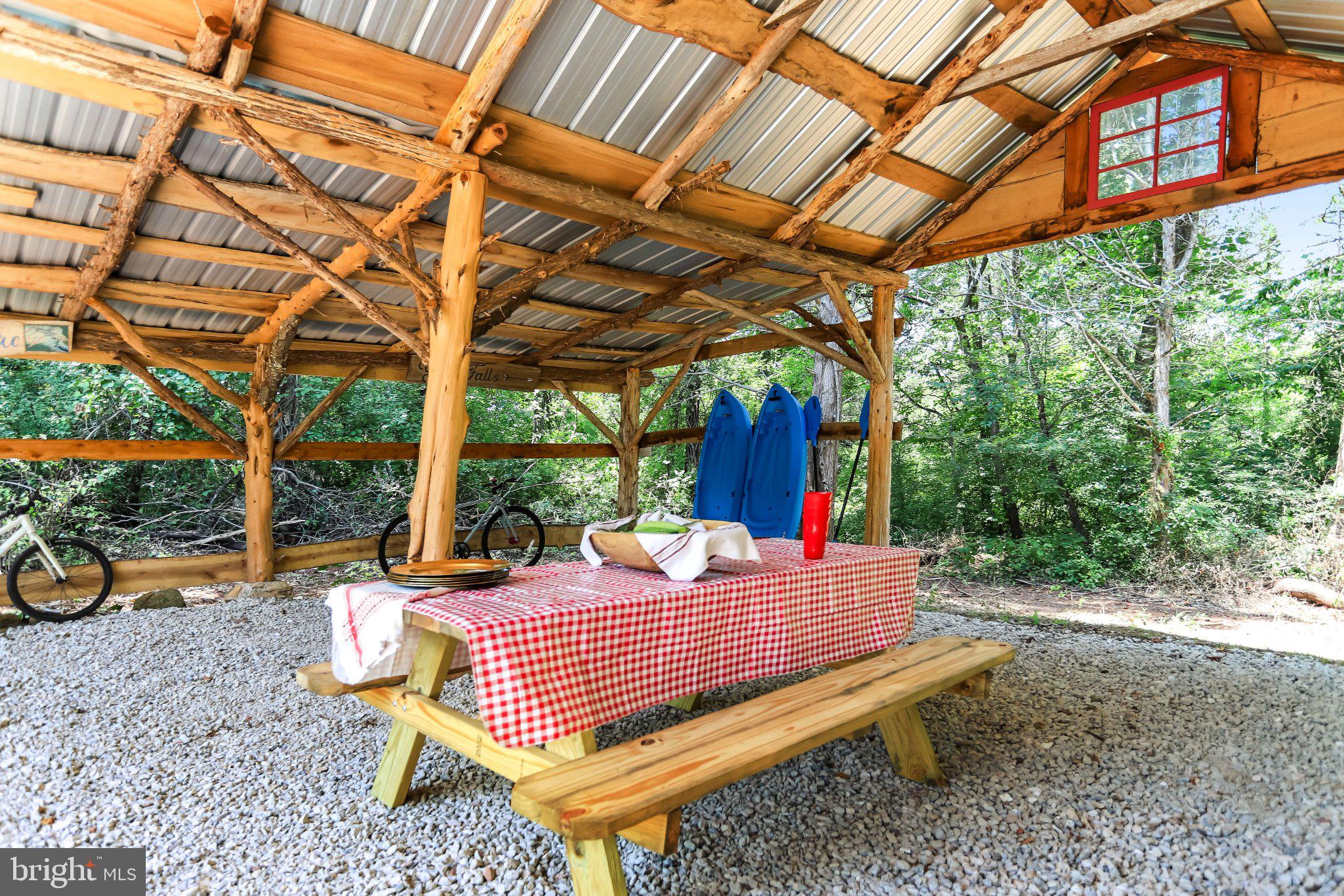 14915 Mount Nebo Road Poolesville, MD 20837 - Photo 31 of 38 Rustic retreat under a shaded canopy.
