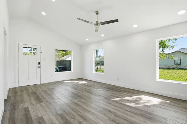 a kitchen with a sink and a refrigerator