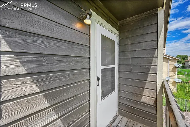 a view of a backyard of a house