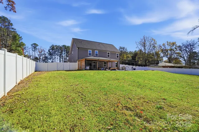 a house view with a garden space