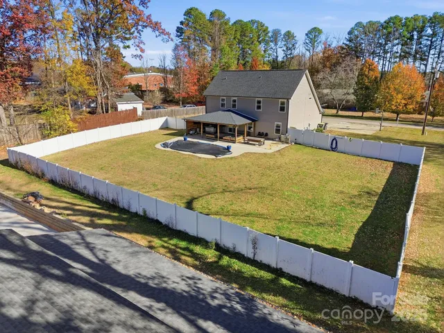 a view of a swimming pool with an outdoor space