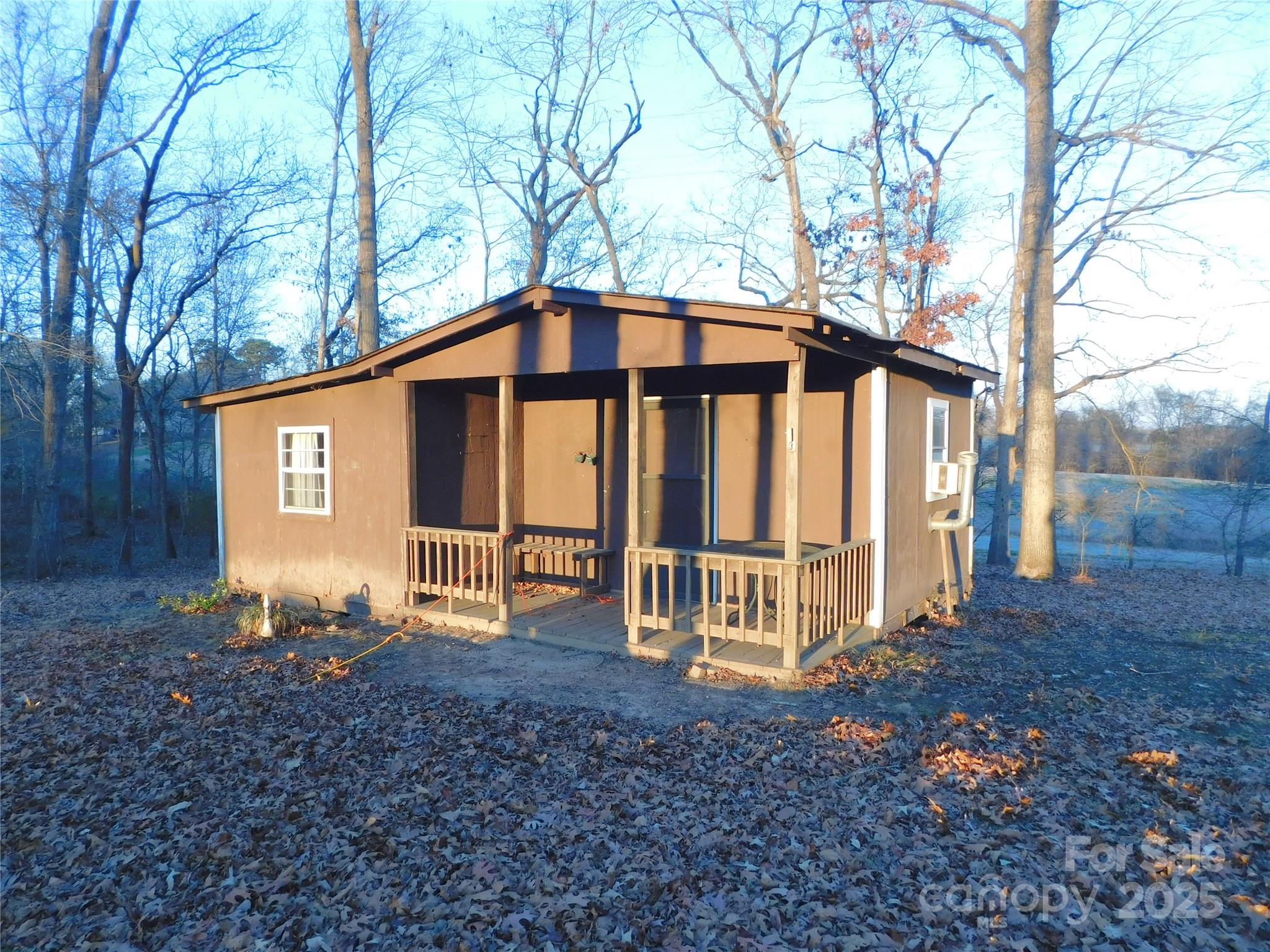 3028 Austin Chaney Road Monroe, NC 28110 - Photo 4 of 16 a front view of a house with garden