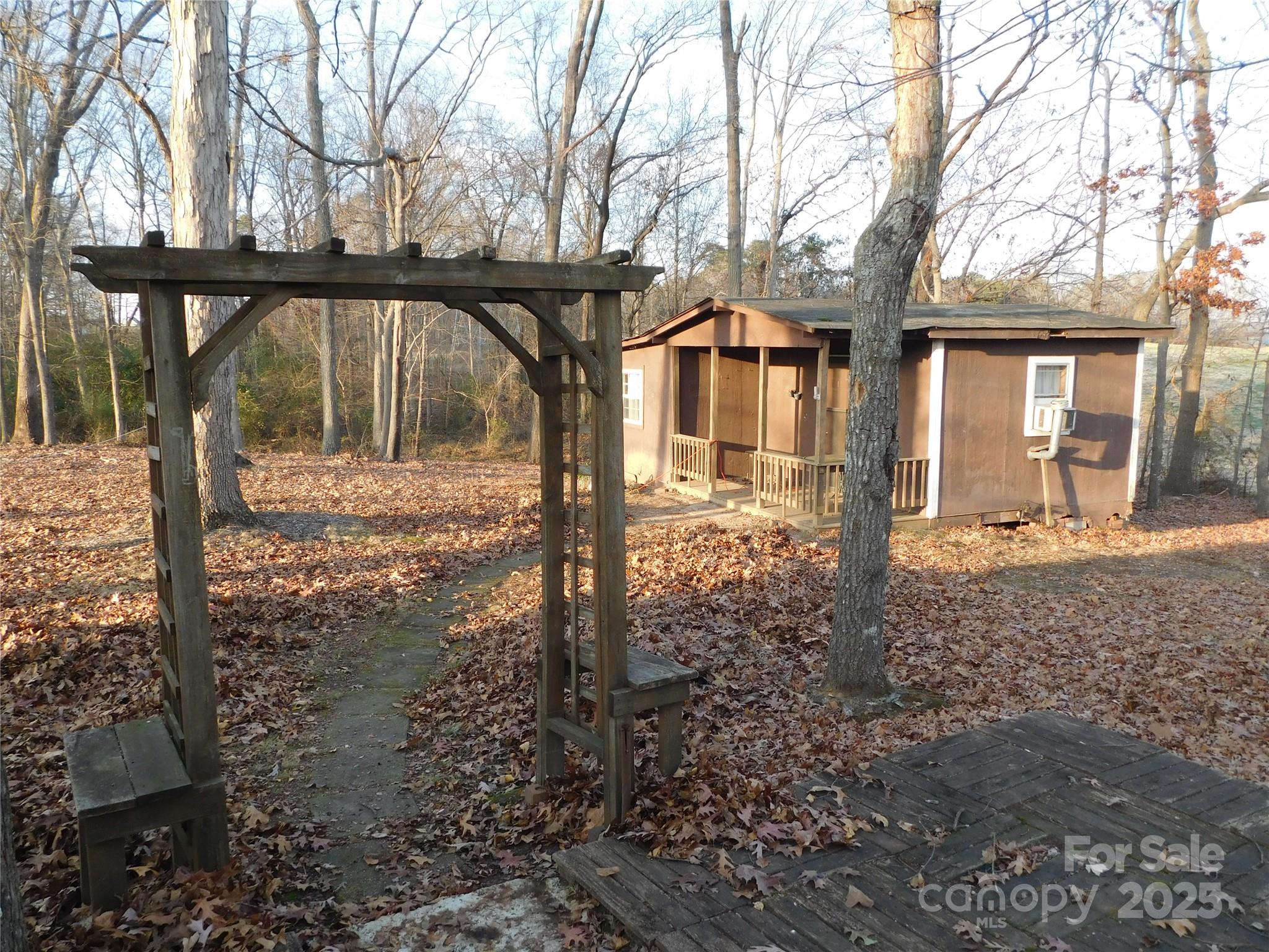 3028 Austin Chaney Road Monroe, NC 28110 - Photo 5 of 16 a view of a house with a yard