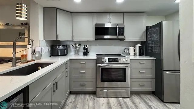 $219,000 | 5035 Wiles Road, Unit 102, Coconut Creek, FL 33073