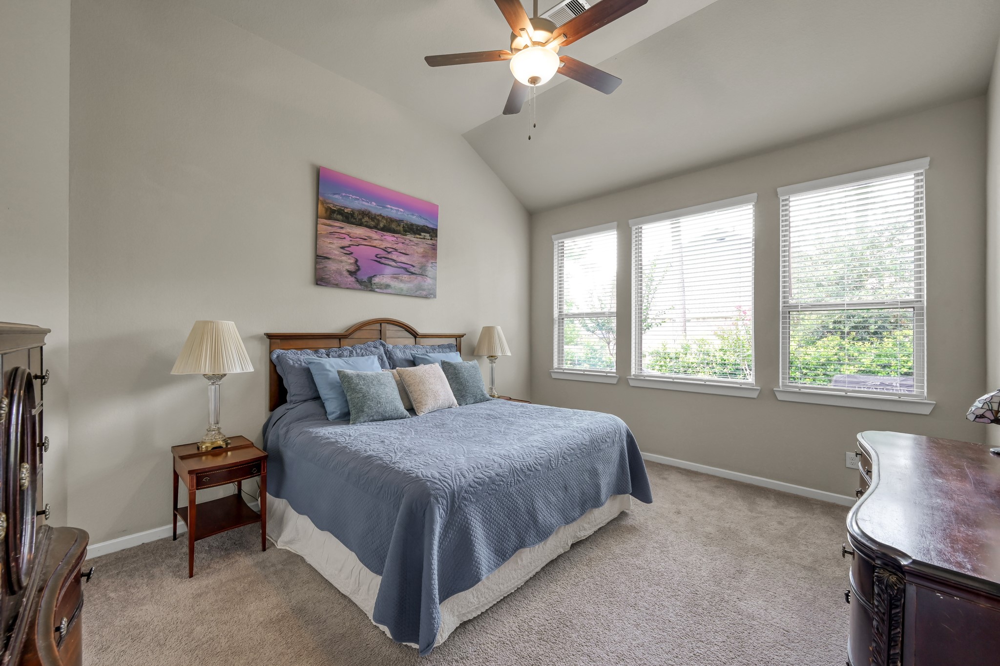 111 Yellow Perch Way Conroe, TX 77318 - Photo 12 of 35 Spacious primary suite with peaceful backyard views.