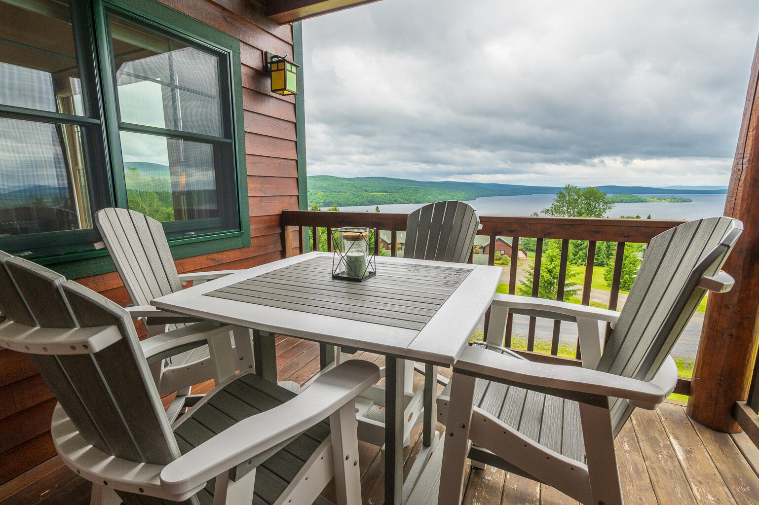 26 Whip Willow Farm Road, Unit 10 Rangeley, ME 04970 - Photo 9 of 35 Private deck off the dining area