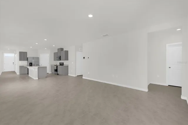 a view of kitchen and white kitchen