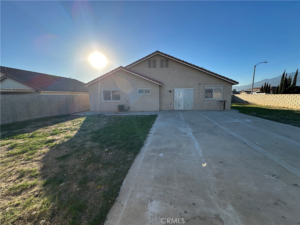 8505 Robinia Street Fontana, CA 92335 - Photo 28 of 30 a house view with a backyard space