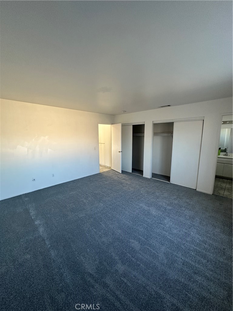 8505 Robinia Street Fontana, CA 92335 - Photo 10 of 30 a view of an empty room with a window