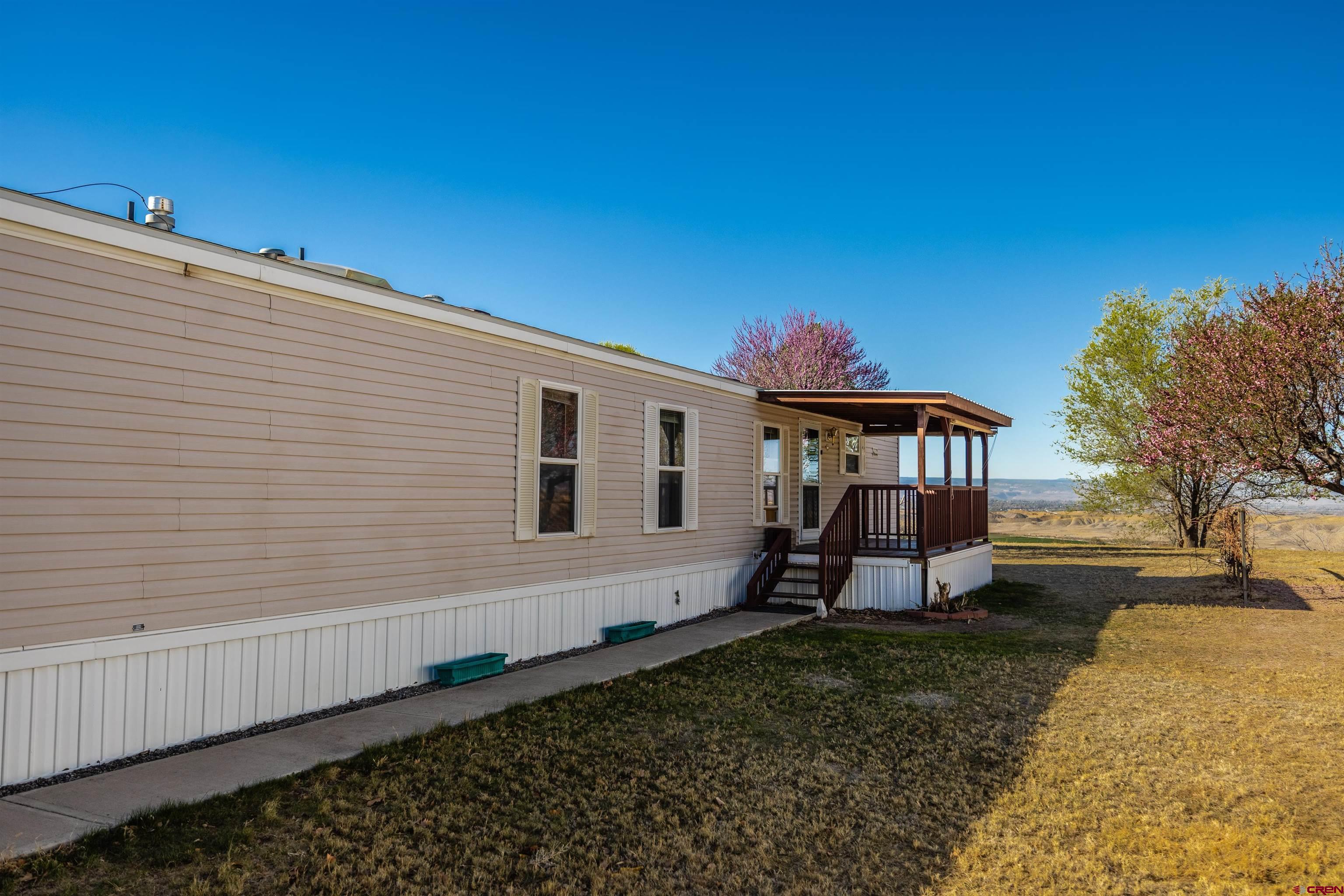 9713 Kebler Road, Unit 28 Austin, CO 81410 - Photo 2 of 25 a house view with a backyard space