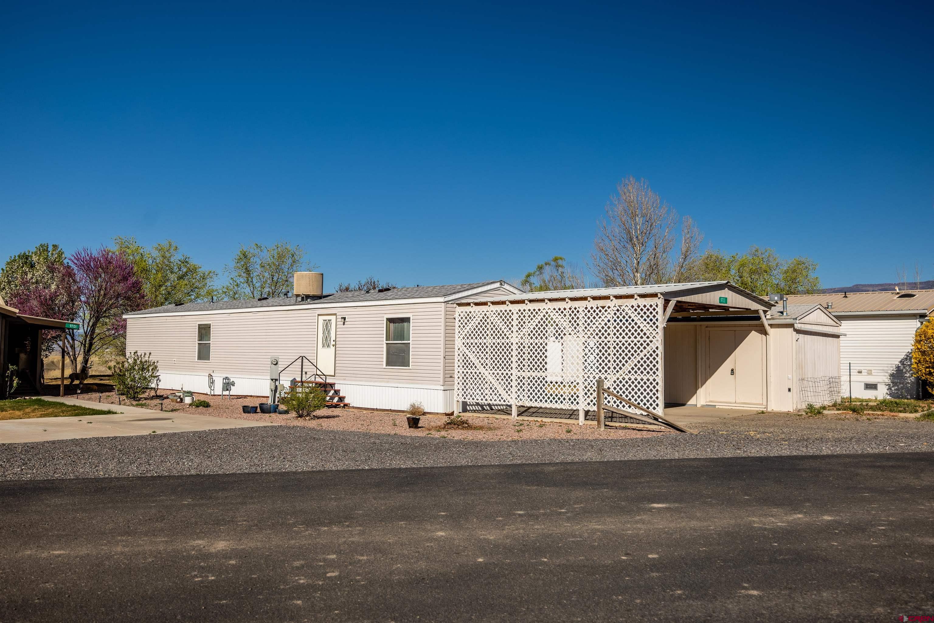 9713 Kebler Road, Unit 28 Austin, CO 81410 - Photo 3 of 25 a view of a street with houses