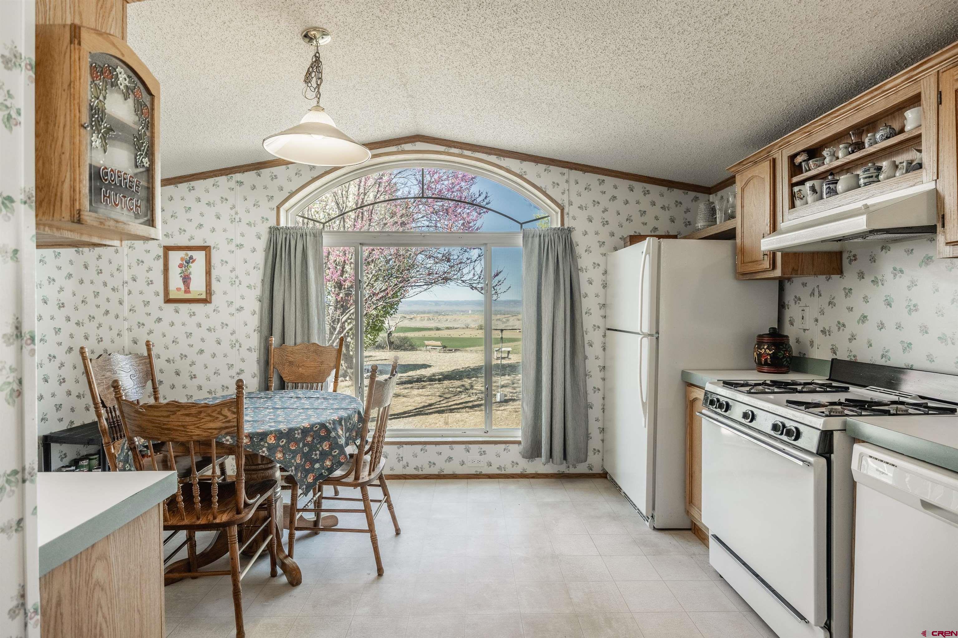 9713 Kebler Road, Unit 28 Austin, CO 81410 - Photo 4 of 25 a view of a dining room with furniture